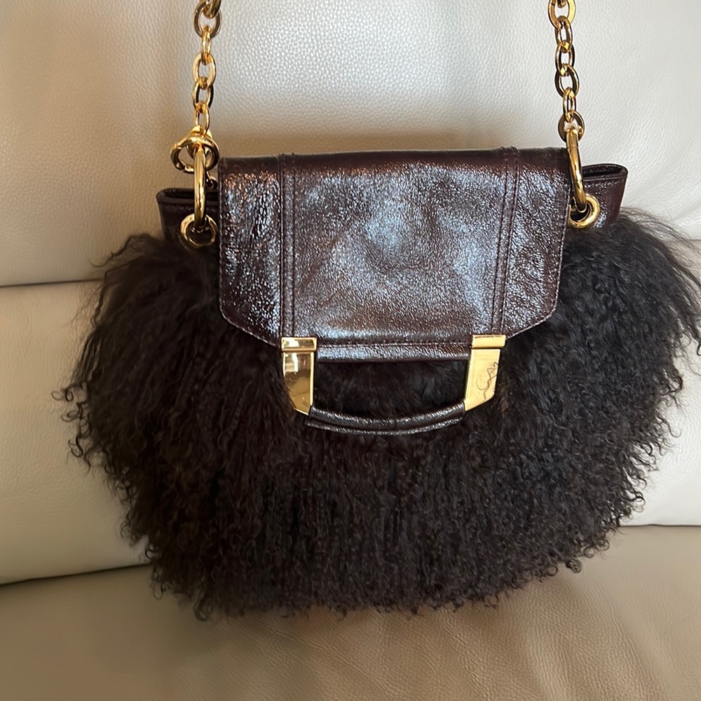 Milly Mongolian sheep fur chocolate brown cross body.